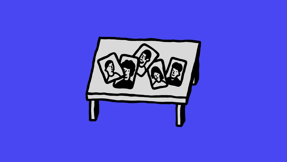 A Soulmates.ai style cartoon image of headshots on a table.